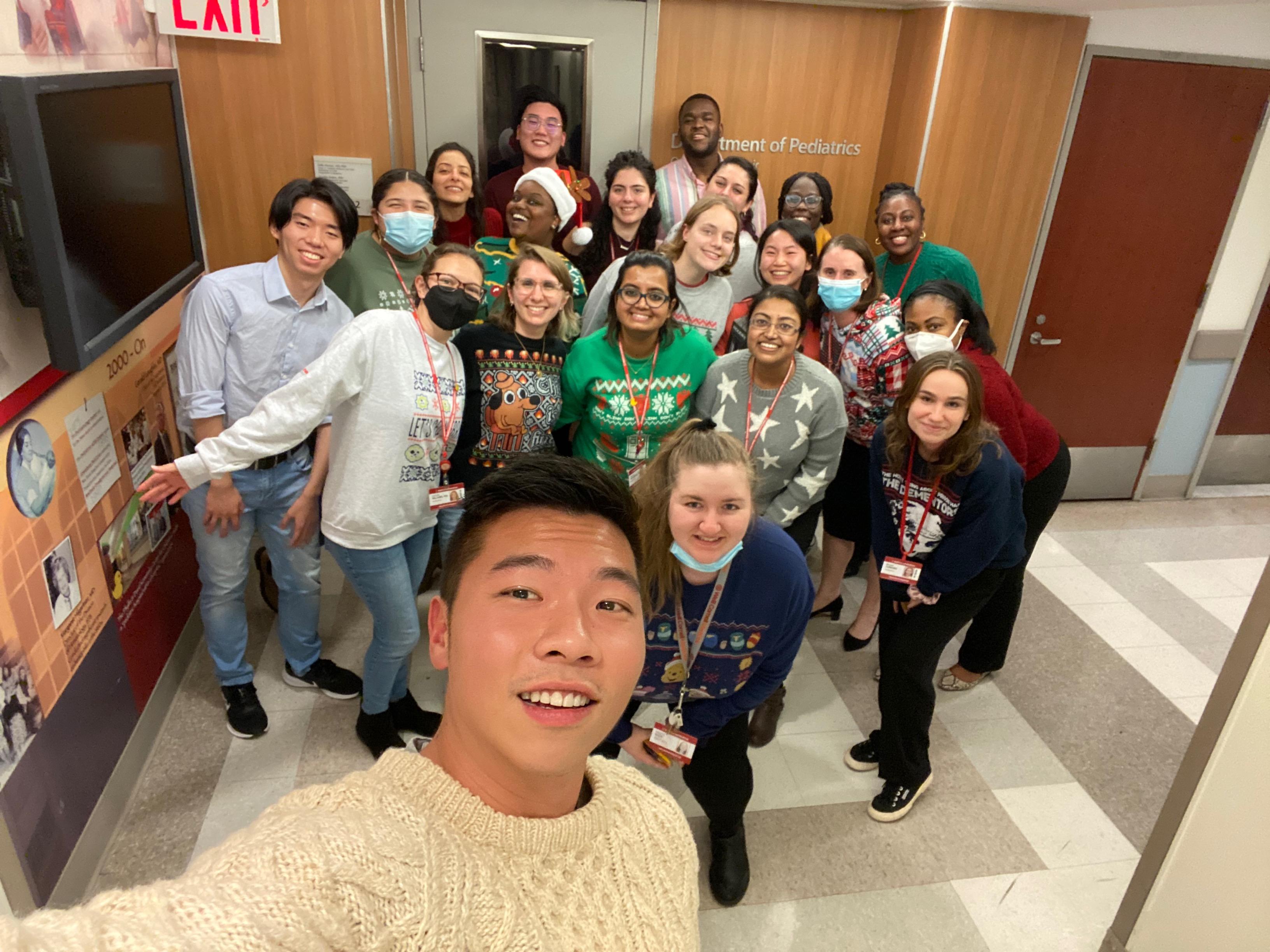 Fouda Lab Team at their Winter Holiday party selfie